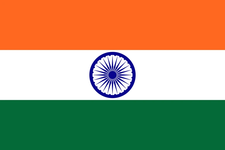 The flag of India is composed of three equal horizontal bands of saffron, white and green. A navy blue wheel with twenty-four spokes — the Ashoka Chakra — is centered in the white band.
