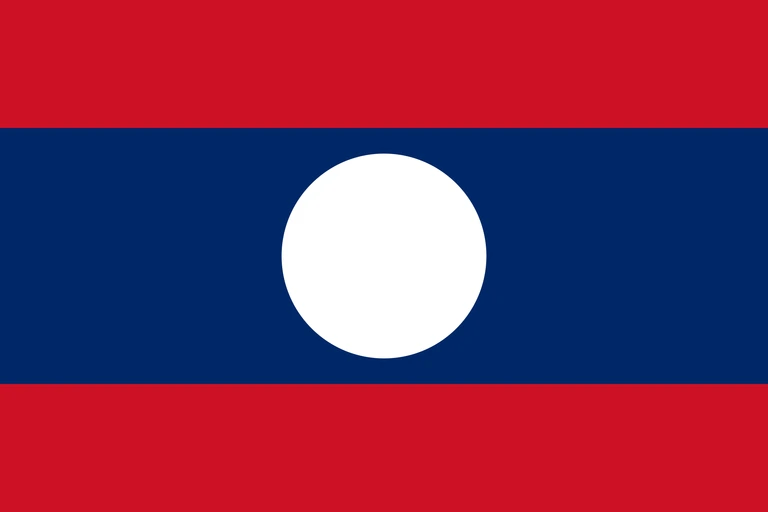 The flag of Laos is composed of three horizontal bands of red, blue and red. The blue band is twice the height of the red bands and bears a white circle at its center.
