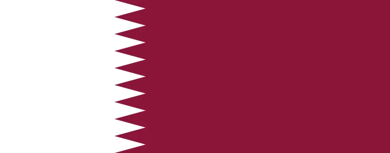 The flag of Qatar has a maroon field, on the hoist side of which is a white vertical band that spans about one-third the width of the field and is separated from the rest of the field by nine adjoining fly-side pointing white isosceles triangles that serve as a serrated line.
