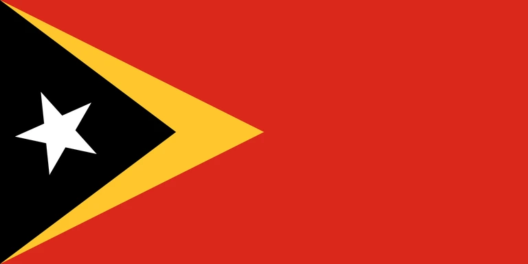 The flag of Timor-Leste has a red field with two isosceles triangles which share a common base on the hoist end. The smaller black triangle, which bears a five-pointed white star at its center and spans one-third the width of the field, is superimposed on the larger yellow triangle that extends to the center of the field.
