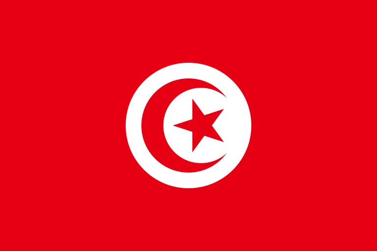 The flag of Tunisia has a red field. A white circle bearing a five-pointed red star within a fly-side facing red crescent is situated at the center of the field.